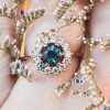 Alexandrite cluster halo engagement ring