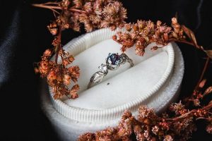 Three stone twig leaf engagement ring