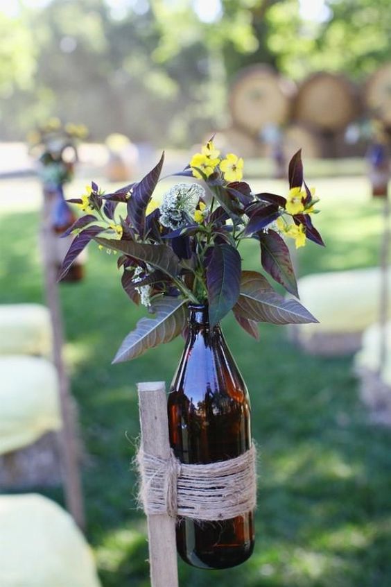 Line the isles with wine bottles to match the tables