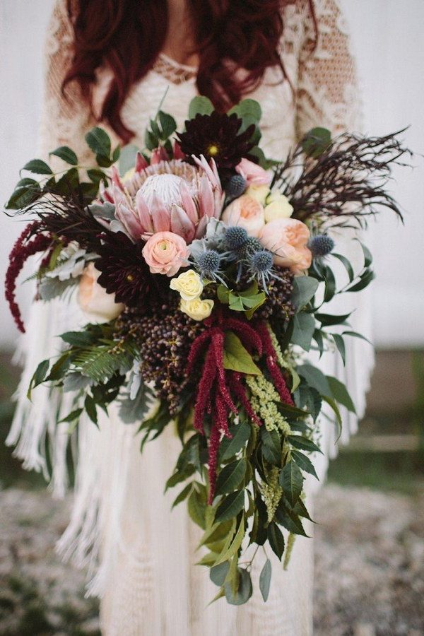 boho pink proteas and greenery eucalyptus wedding bouquet