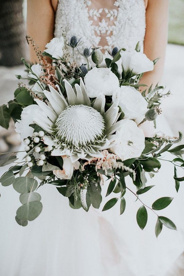 boho wite king protea and eucalyptus wedding bouquets