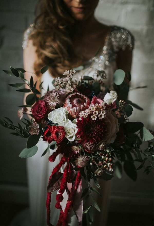 deep red roses pink proteas gand greenery eucalyptus wedding bouquet ideas for winter