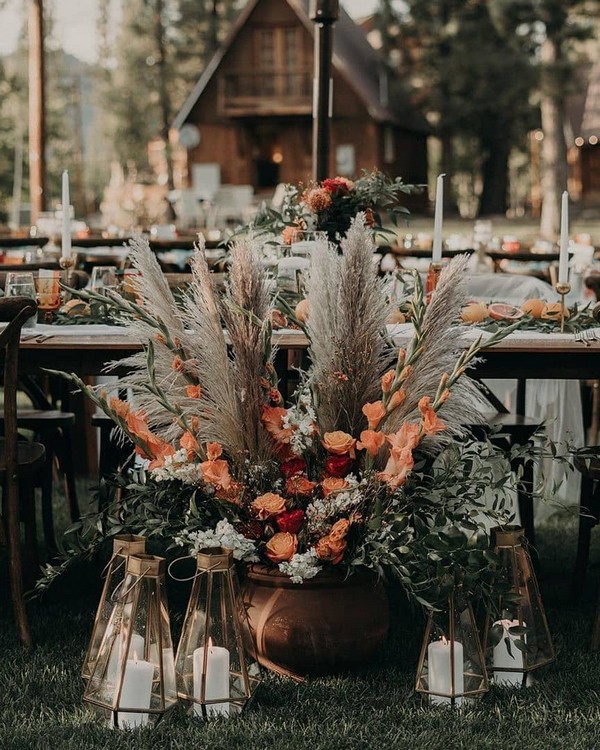 dusty orange roses and pampas grass wedding reception decor