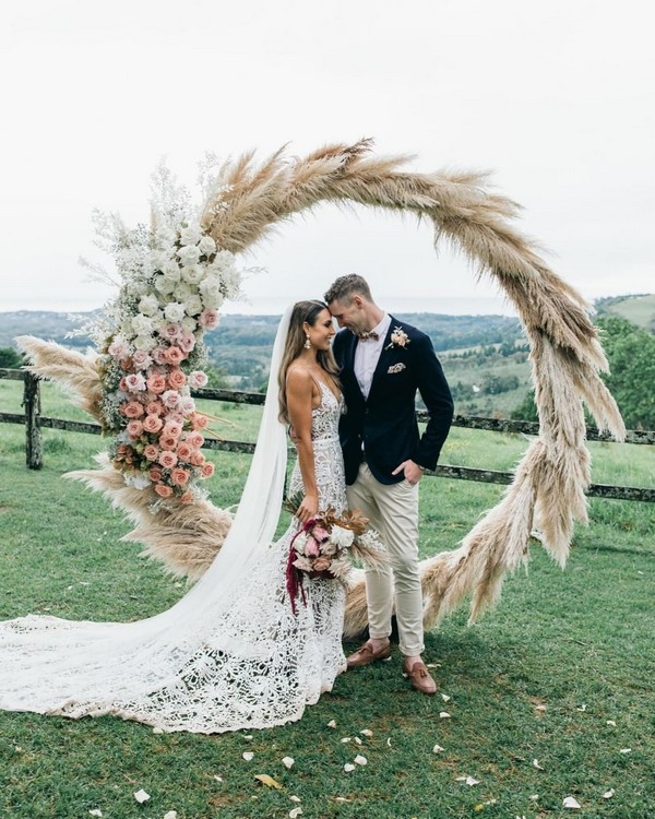 mixed pampas grass and white blush pink roses circle wedding backdrop